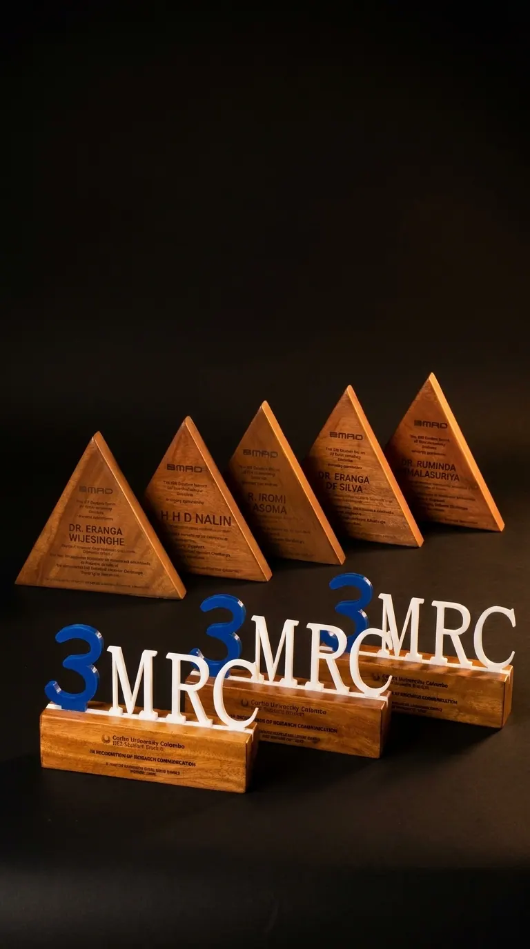 Full set of laser-engraved timber pyramid awards and 3D embossed 'MRC' letter trophies made for the IEEE Student Branch at Curtin University Colombo