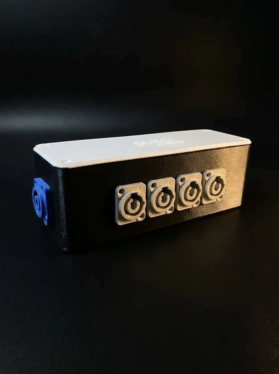Custom 3D printed power connector enclosure with four panel-mount connectors and a blue input connector